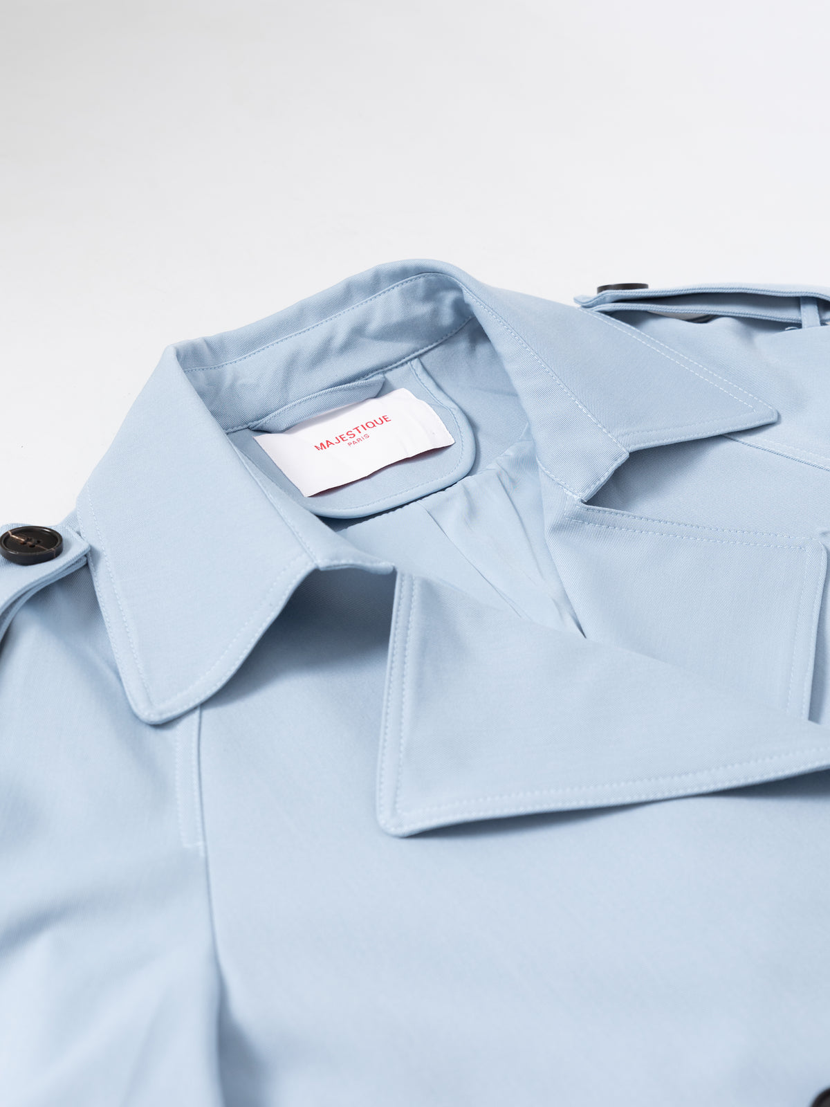 Sky blue belted trench coat MJ272606, collar and label detail